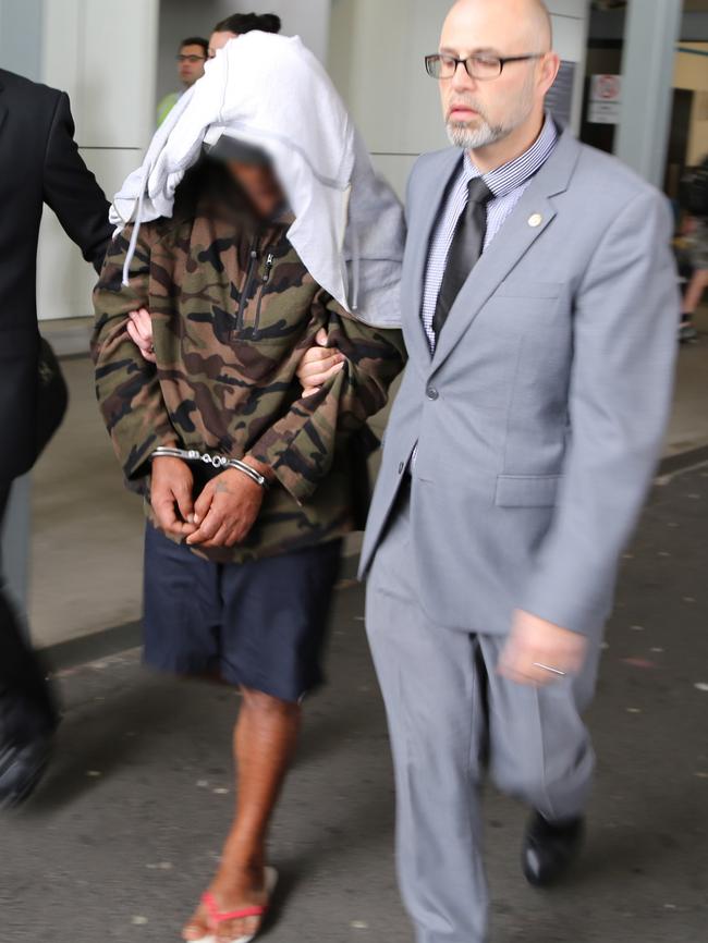 Former Kings Cross bouncer Alani Afu is arrested by police.