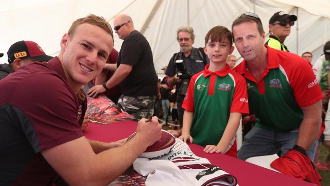 DCE meets Maroons fans Matt Faint and son Corey (9). (Peter Wallis)