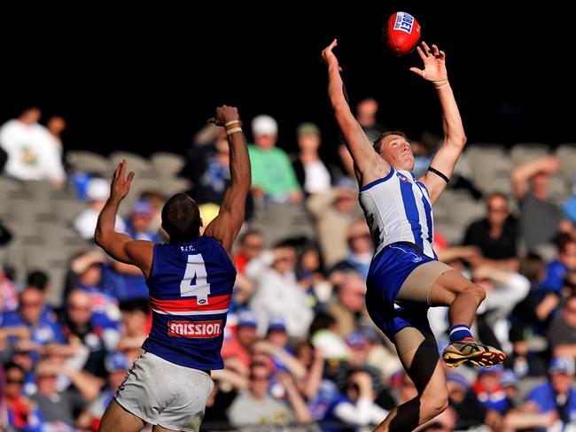 Nathan O'Keefe flies for a mark for North Melbourne at the MCG.