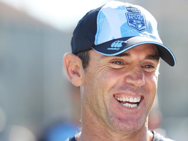 NSW coach Brad Fittler shares a joke during training. Picture: Brett Costello