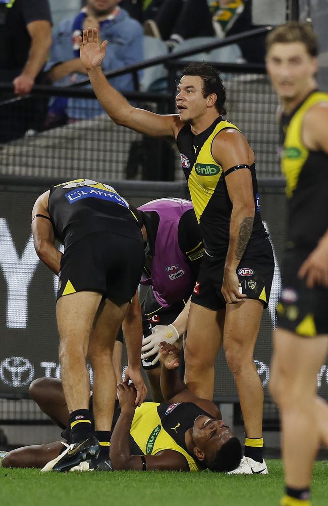 Maurice Rioli in pain after hurting his leg late. Picture: Michael Klein