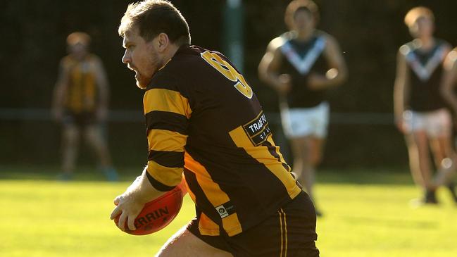 Allan Young in action for Heidelberg West. Picture: Hamish Blair