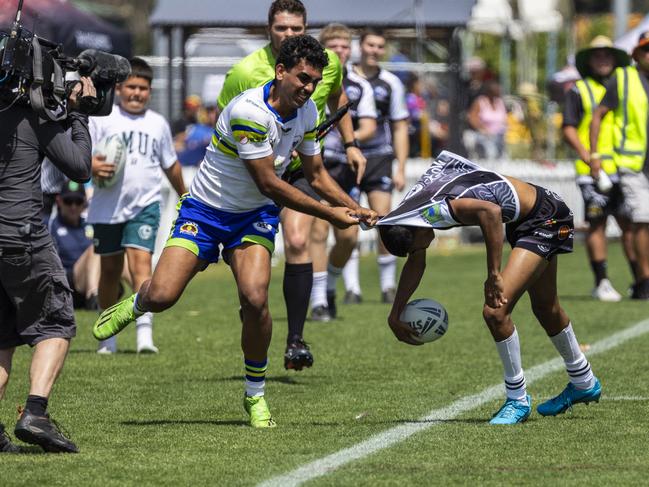 Joshua Donovan takes Dwayne Lyons close to the sideline. Picture: Andrea Francolini