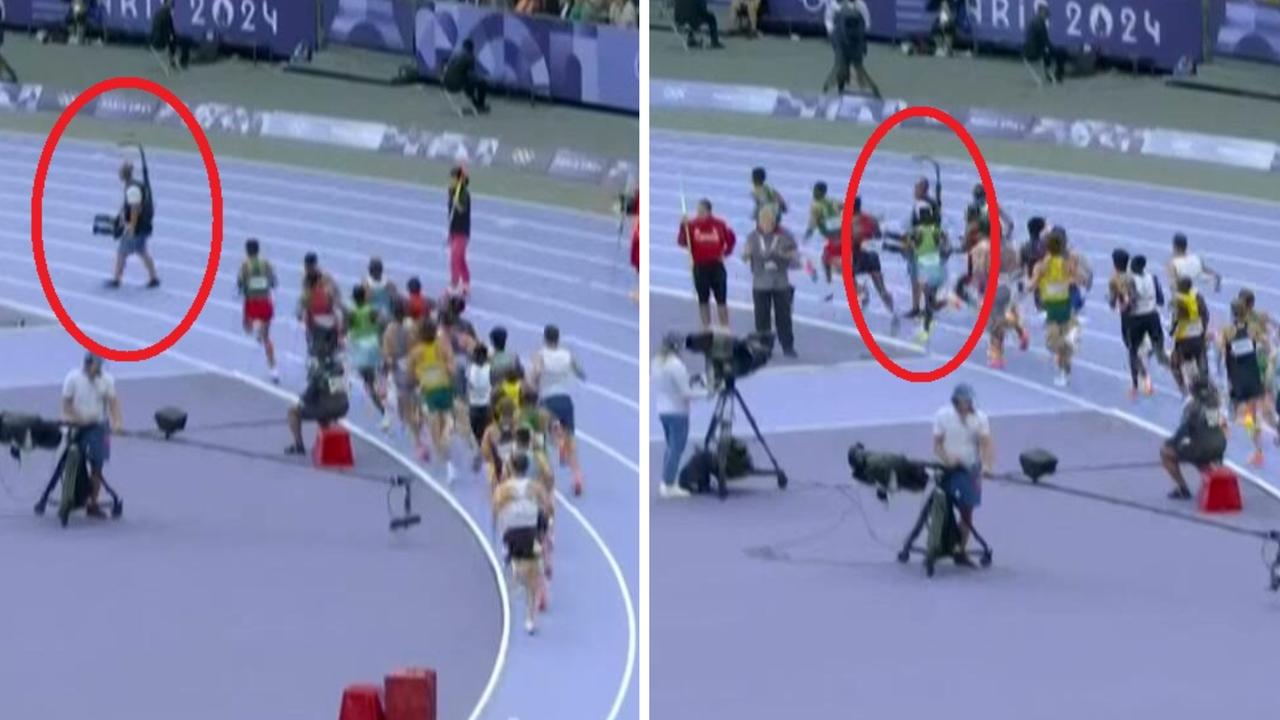 An oblivious cameraman walked out onto the track.