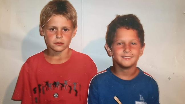 Jesse Carsburg as a child, pictured with his friend Joshua Taylor.