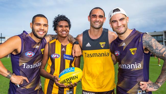 Hawthorn’s No. 1 fan Ceberio (Cebby) Johnson, 14, with Hawks stars Jarman Impey, Shaun Burgoyne and Chad Wingard last month. Picture: Sarah Matray