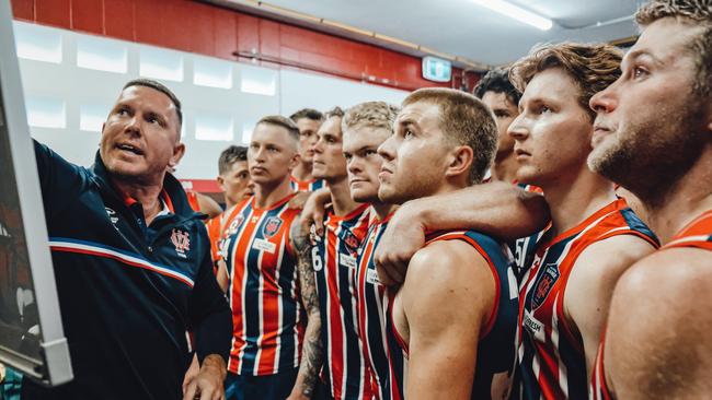 Wilston Grange head coach Brent Moloney at the halftime team talk. Picture: Brooke Sleep Media