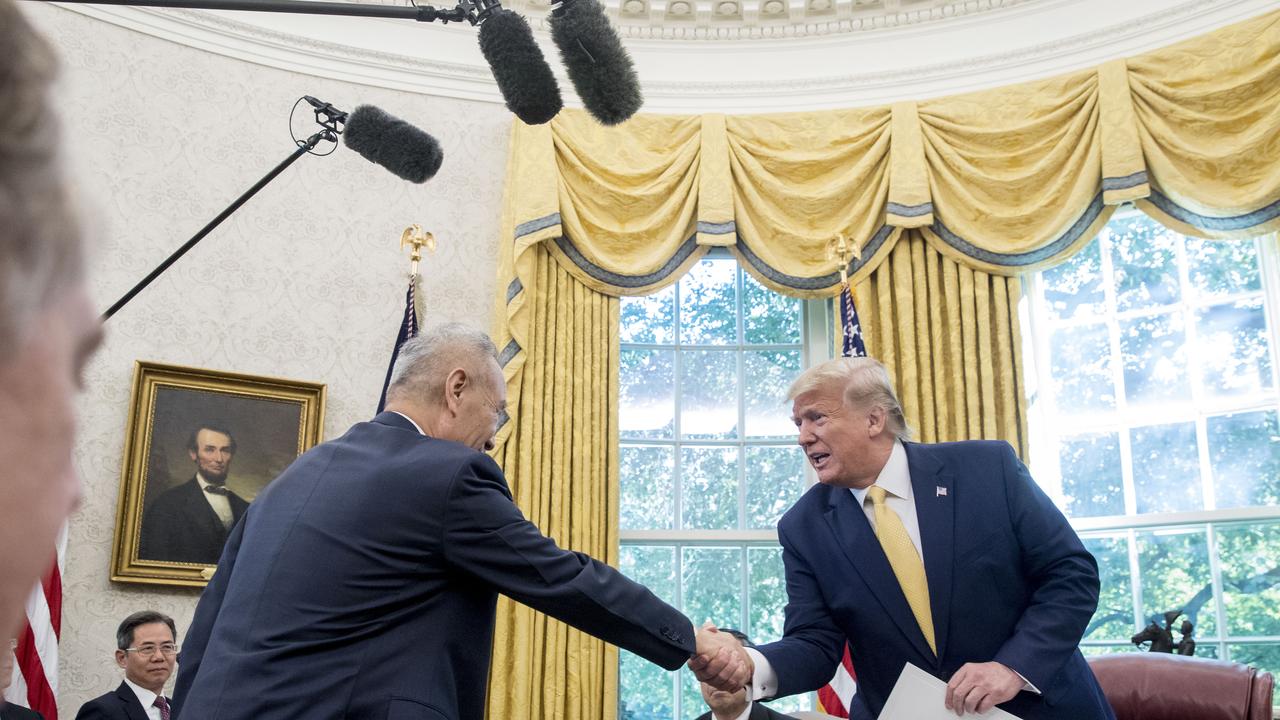 President Donald Trump shakes hands with Chinese Vice Premier Liu He in the Oval Office of the White House. Picture: AP