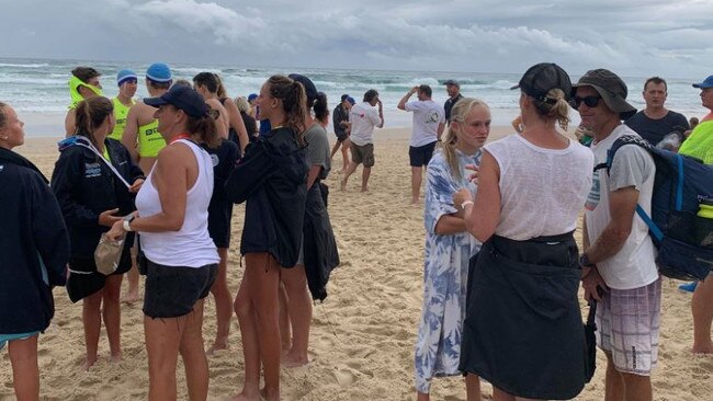 Hundreds of Australian surf life saving competitors waited on the beach to see if competitions would resume after a sting ray sighting on Saturday. 