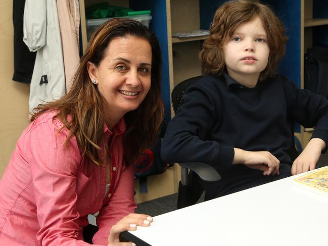 Principal Trish Karedis in a classroom with student Sam at Giant Steps on Friday, September 13, 2019, in Kew, Victoria, Australia. Picture: Hamish Blair