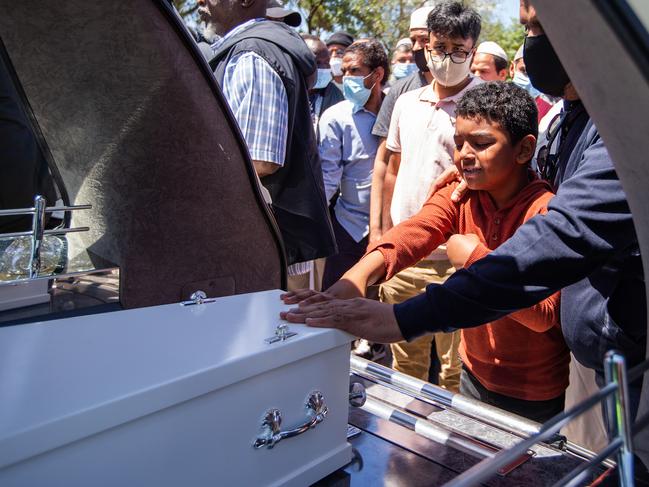 People saying their goodbyes to the four young victims. Picture: Sarah Matray