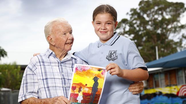 Cambridge Park Public School student Savannah-Lee Presbury with her great-grandfather, James Considine, 90. Picture: Richard Dobson