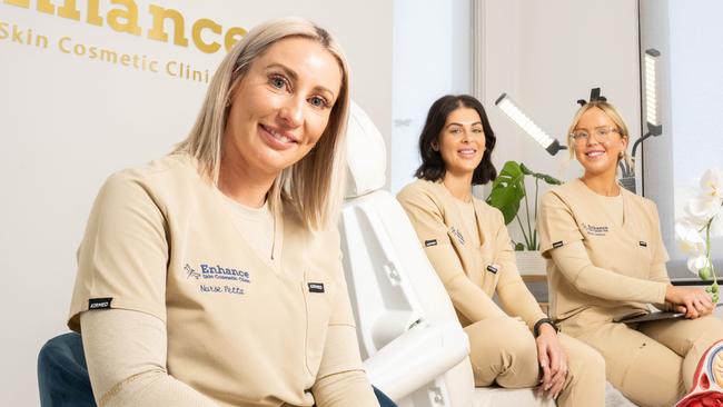 Petta Day, owner of Enhance Skin Cosmetic Clinic, with staff Alanna Milosevic and Candice McCue, at the clinic in Largs Bay which has been named SA's best injector after three years in the top 10. Largs Bay, Saturday, September 16, 2023. (The Advertiser/ Morgan Sette)