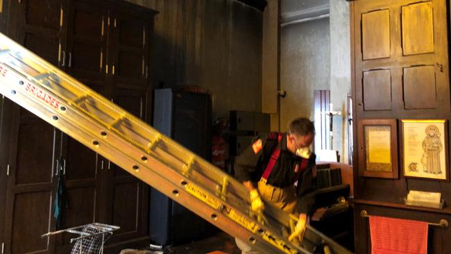 Clean-up and assessment of the damage is under way at St Carthag’'s Cathedral, Lismore, after a fire. Picture: Alison Paterson