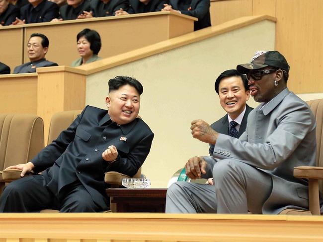 North Korean leader Kim Jong-un and former US basketball star Dennis Rodman watching a basketball game between in Pyongyang. Picture: AFP