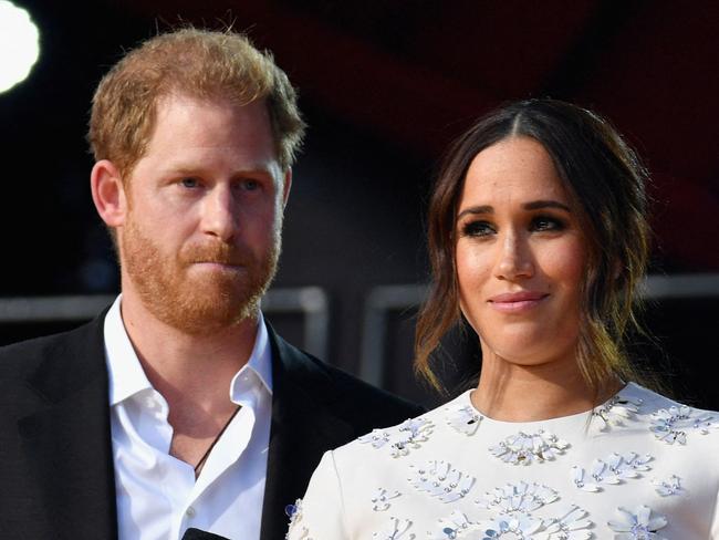 (FILES) Britain's Prince Harry and Meghan Markle speak during the 2021 Global Citizen Live festival at the Great Lawn, Central Park on September 25, 2021 in New York City. A multi-million-dollar deal between a media group run by Britain's Prince Harry and his wife Meghan Markle, and streaming giant Spotify is to end, a report said June 15, 2023. (Photo by Angela Weiss / AFP)