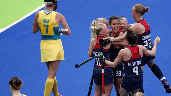 USA players celebrate after scoring against Australia.