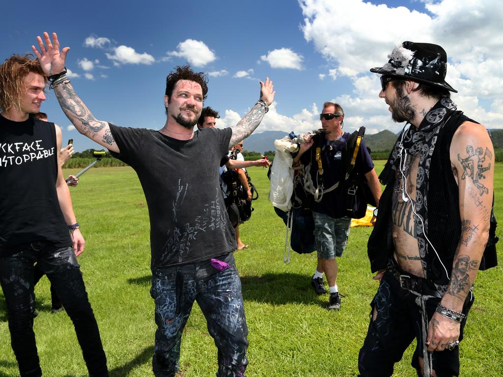 Bam Margera tells Brandon Novak about skydiving during a visit to Cairns.