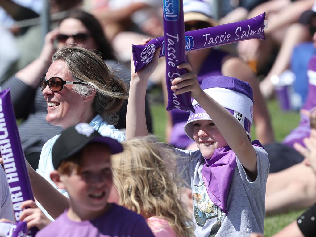 Fans enjoying the hot weather at the Big Bash match between the Hurricanes and Melbourne Stars at Blundstone Arena on Christmas Eve. Picture: LUKE BOWDEN