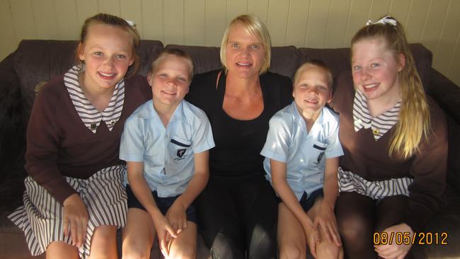 Zoe McGinty with her mother Kirsten and and siblings  Ben, Zac and Bridget in 2012.