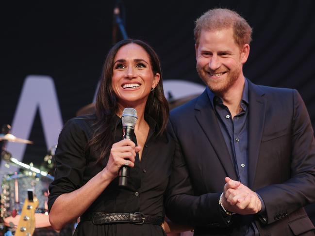 DUESSELDORF, GERMANY - SEPTEMBER 12: Prince Harry, Duke of Sussex and Meghan, Duchess of Sussex speak on stage at the "Friends @ Home Event" at the Station Airport during day three of the Invictus Games DÃÂ¼sseldorf 2023 on September 12, 2023 in Duesseldorf, Germany. (Photo by Chris Jackson/Getty Images for the Invictus Games Foundation)