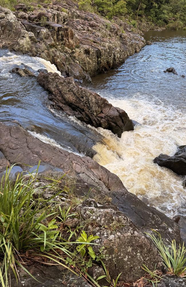 Swimmers have been known to become trapped under the fast flowing waters at Wappa Falls at Yandina.