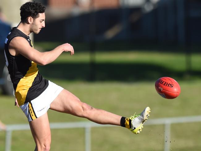 Jake Parente gets his boot to the ball. Picture: Lawrence Pinder