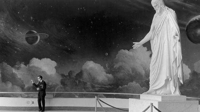 In the Mormon temple a guide waves goodbye to his group. Picture: Getty Images