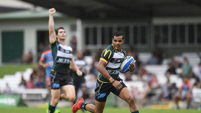 Michael Purcell in action in a game where he scored two tries for the Jets.