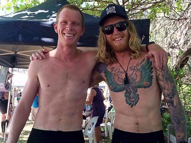 Jake Malby, right, and his brother Ben after Jake's first 42km marathon at Cairns.