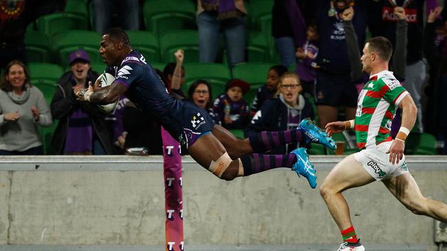 Suliasi Vunivalu dives to score a try for the Storm. Picture: Getty Images