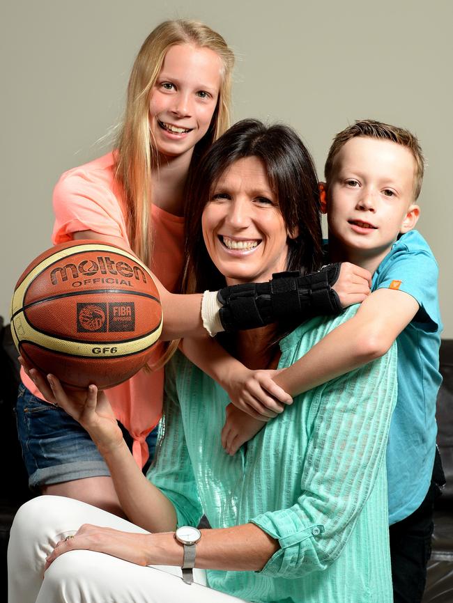 Rachael Sporn with her children Teja, 12, and Kade, 8. Picture Campbell Brodie