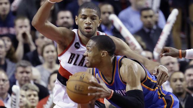 Portland Trail Blazers forward Nicolas Batum plays tight defence against Westbrook.