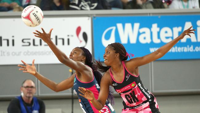 Mwai Kumwenda of the Vixens takes the ball in front of Ama Agbeze of the Thunderbirds.