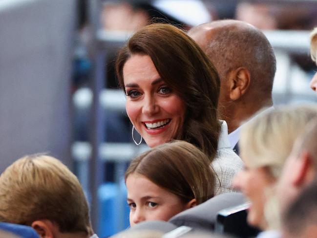 Kate was upbeat as she sat with her family in the front row of the royal box. Picture: AFP