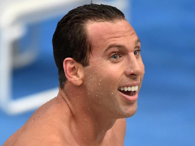 (FILES) This file photo taken on April 3, 2015 shows Olympic champion Grant Hackett smiling after finishing third in the 400-metres freestyle final in his comeback swim after seven years out of the pool at Australia's world championship trials in Sydney. Australian Olympic swimming great Grant Hackett has blamed excessive drinking and anxiety attacks for a series of unsavoury incidents that badly tarnished his reputation. The 37-year-old sought help for mental health issues in February 2017 after being arrested at his parents' home following a family bust-up.   / AFP PHOTO / Peter PARKS / -- IMAGE RESTRICTED TO EDITORIAL USE - STRICTLY NO COMMERCIAL USE --