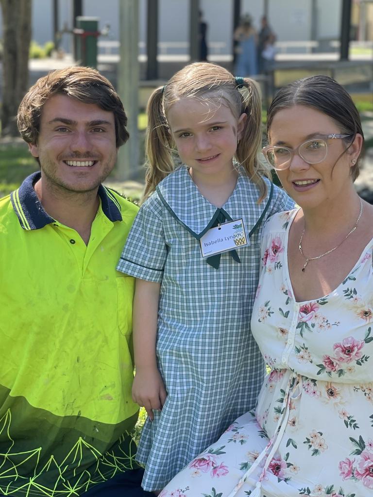 Isabella Lynam arrives at prep with her parents on the first day of school in 2024 at Carbrook State School. Pictures: Elliott Turner