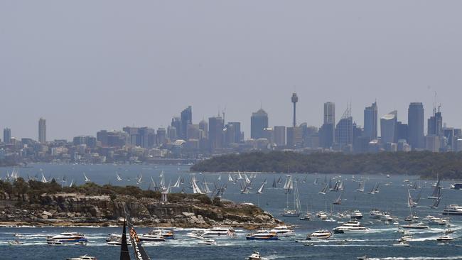 InfoTrack leads the fleet at the start of the Sydney to Hobart Yacht race, seen from North Head in Sydney, Thursday, December 26, 2019. (AAP Image/Mick Tsikas) NO ARCHIVING