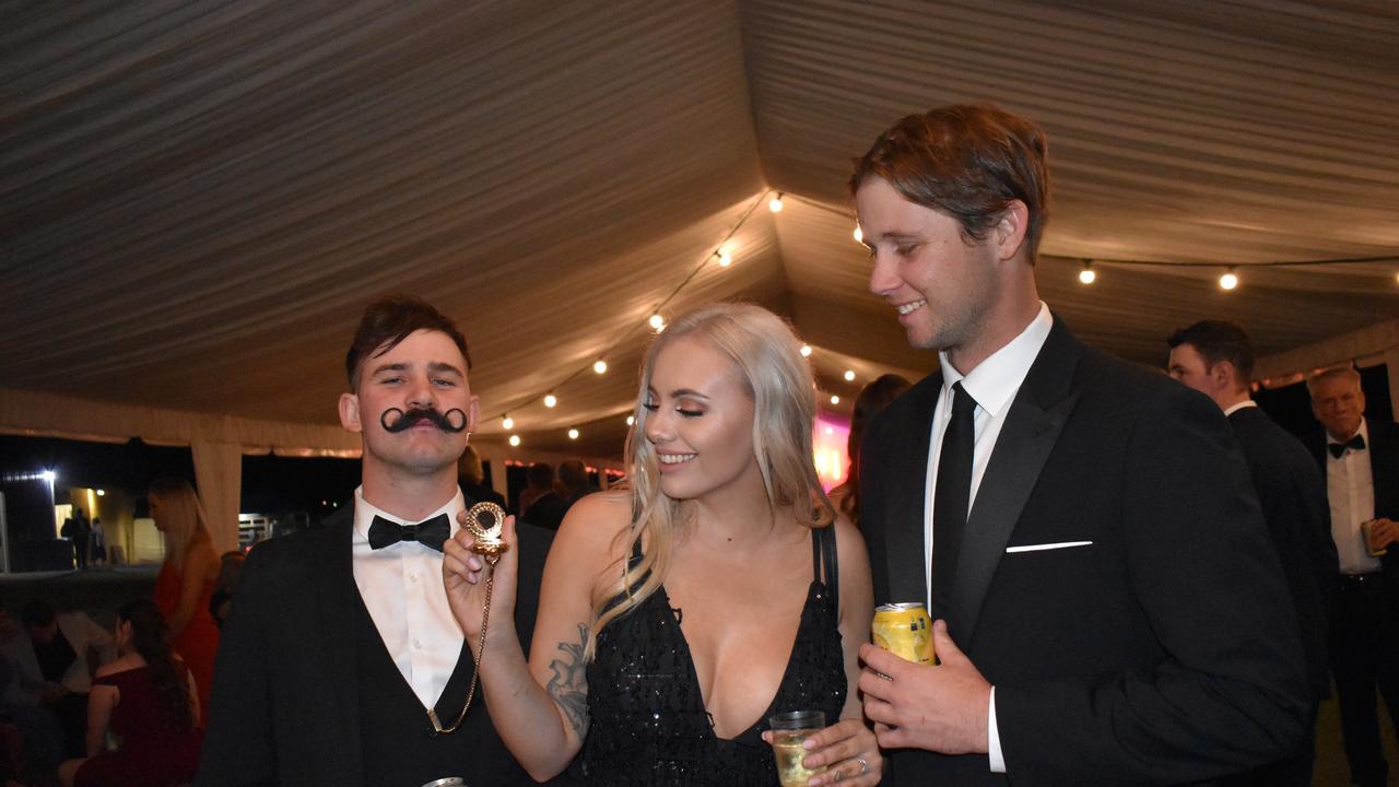 Brent Smith of McEwens Beach, Melynda Attreed of Mackay, and Connor Tilney of Yeppoon at the 2021 Proserpine Show Ball. Picture: Kirra Grimes.