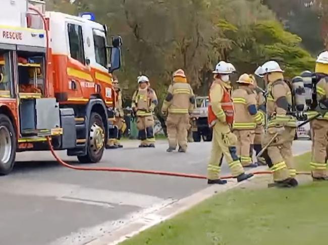 Emergency services were called to the scene at a Woodridge house fire