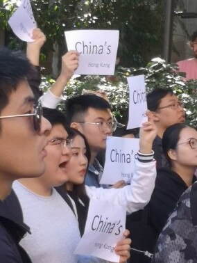 Pro Chinese students counter the UQ protesters.