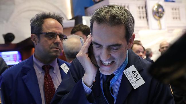 Traders work on the floor of the New York Stock Exchange. Picture: Getty Images