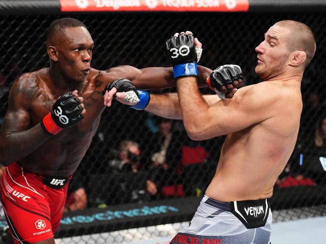 Adesanya just misses with a left hand. Picture: Chris Unger/Zuffa LLC via Getty Images