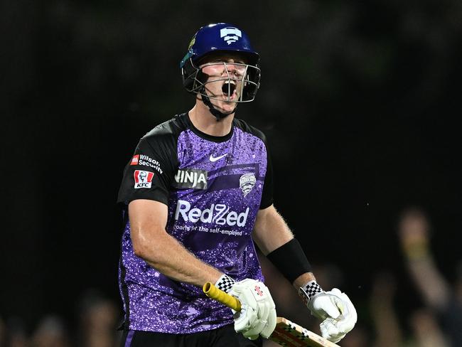 HOBART, AUSTRALIA - JANUARY 27: Mitch Owen of the Hurricanes celebrates scoring a century during the BBL The Final match between Hobart Hurricanes and Sydney Thunder at Ninja Stadium on January 27, 2025 in Hobart, Australia. (Photo by Steve Bell/Getty Images)