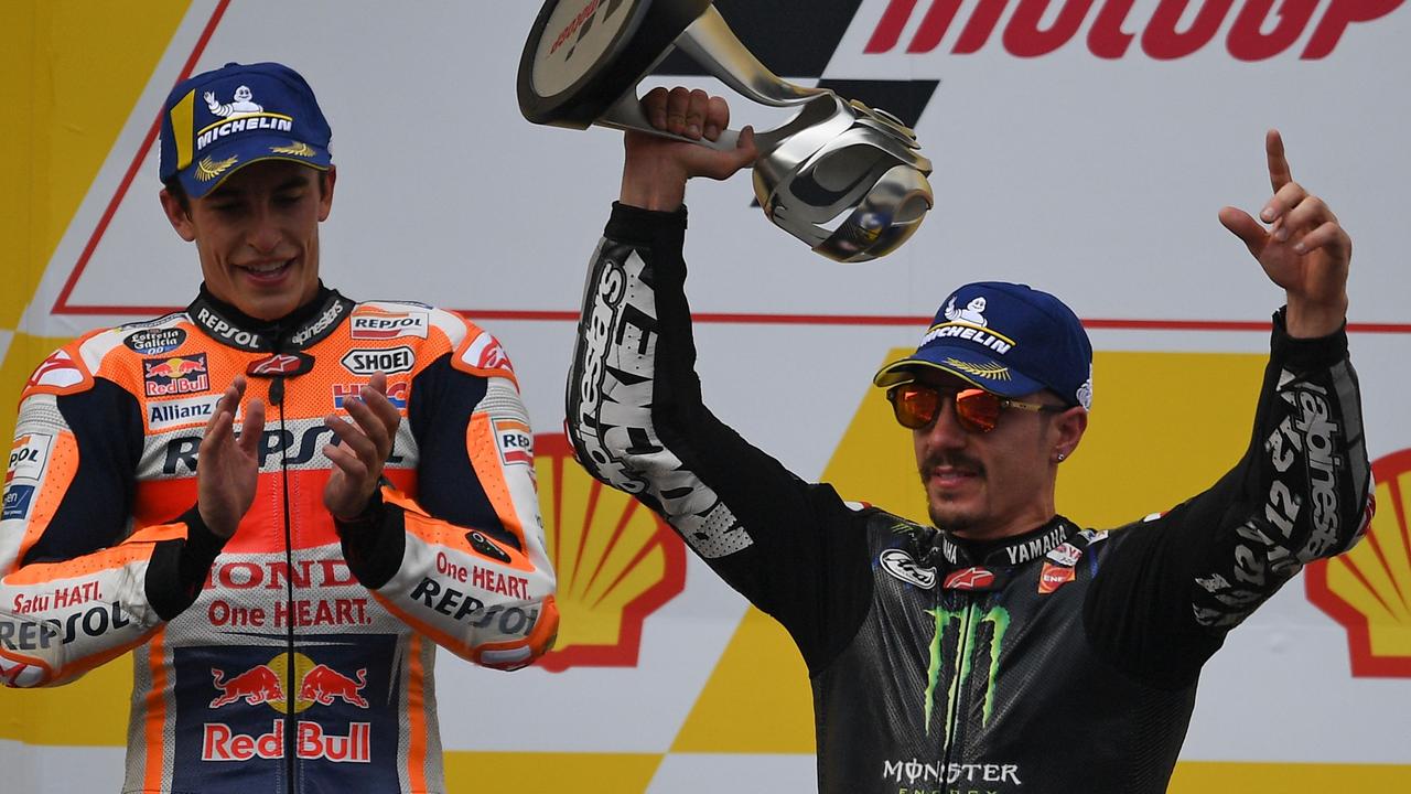 Maverick Vinales celebrates his victory on the podium with second placed Marc Marquez. Picture: Mohd Rasfan