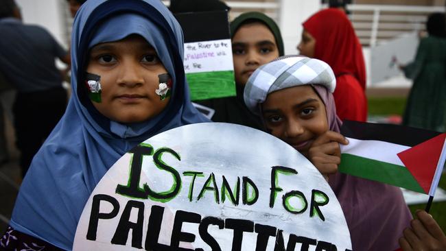 Sidrah Khan, Ayesha Fatima and Safa Khan at a pro-Palestine protest outside of the NT Parliament house on Friday October 27 calling for a ceasefire 20-days into the Gaza conflict.