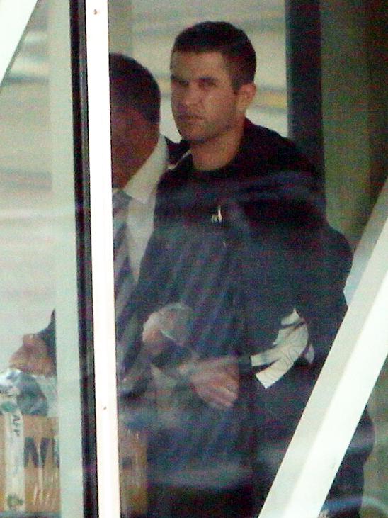 Accused murderer Aaron Donald Carver arriving at Adelaide Airport. Picture: Emma Brasier/AAP