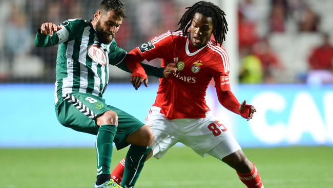 Benfica's midfielder Renato Sanches vies for the ball.