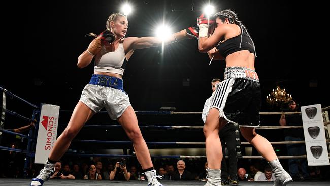 Tayla Harris lands a punch to Sarah Dwyer during the Australian Title Fight at Melbourne Pavillion. Picture: Quinn Rooney/Getty Images