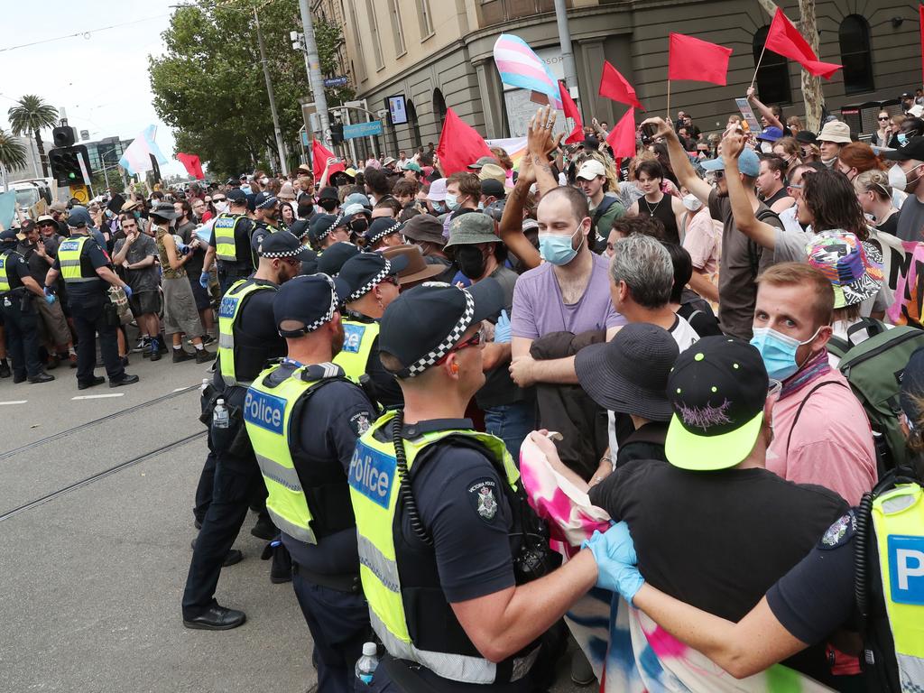 Anti-trans and pro-LGBTQI+ rights campaigners clashed at the rally. Picture: NCA NewsWire / David Crosling